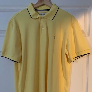 Izod Performx polo medium yellow blue stripe on collar.